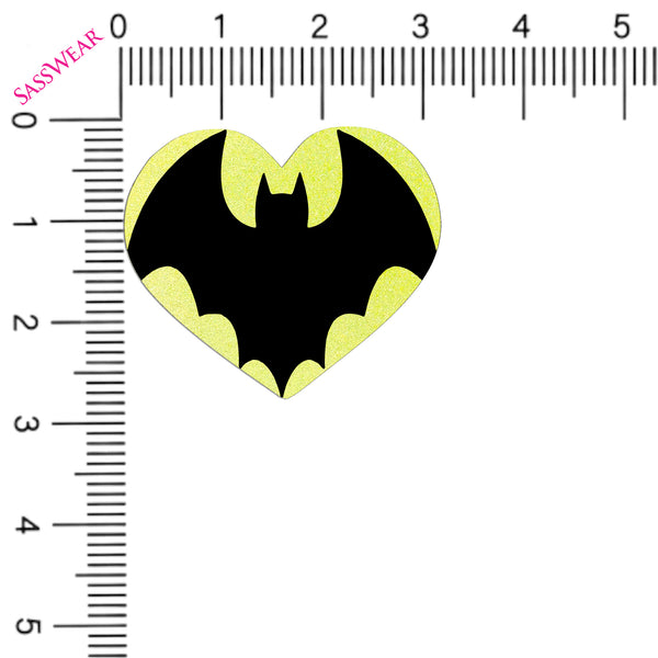 Heart-shaped bat symbol with a ruler on the left side for scale