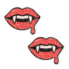 Illustration of glittery lips with fangs on a white background