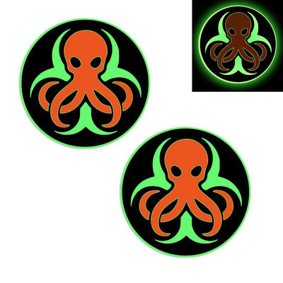 Three circular stickers with orange octopus designs on a black background, one of which is shown glowing.