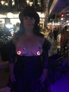 light up spiderweb pasties on woman at fantasy fest key west